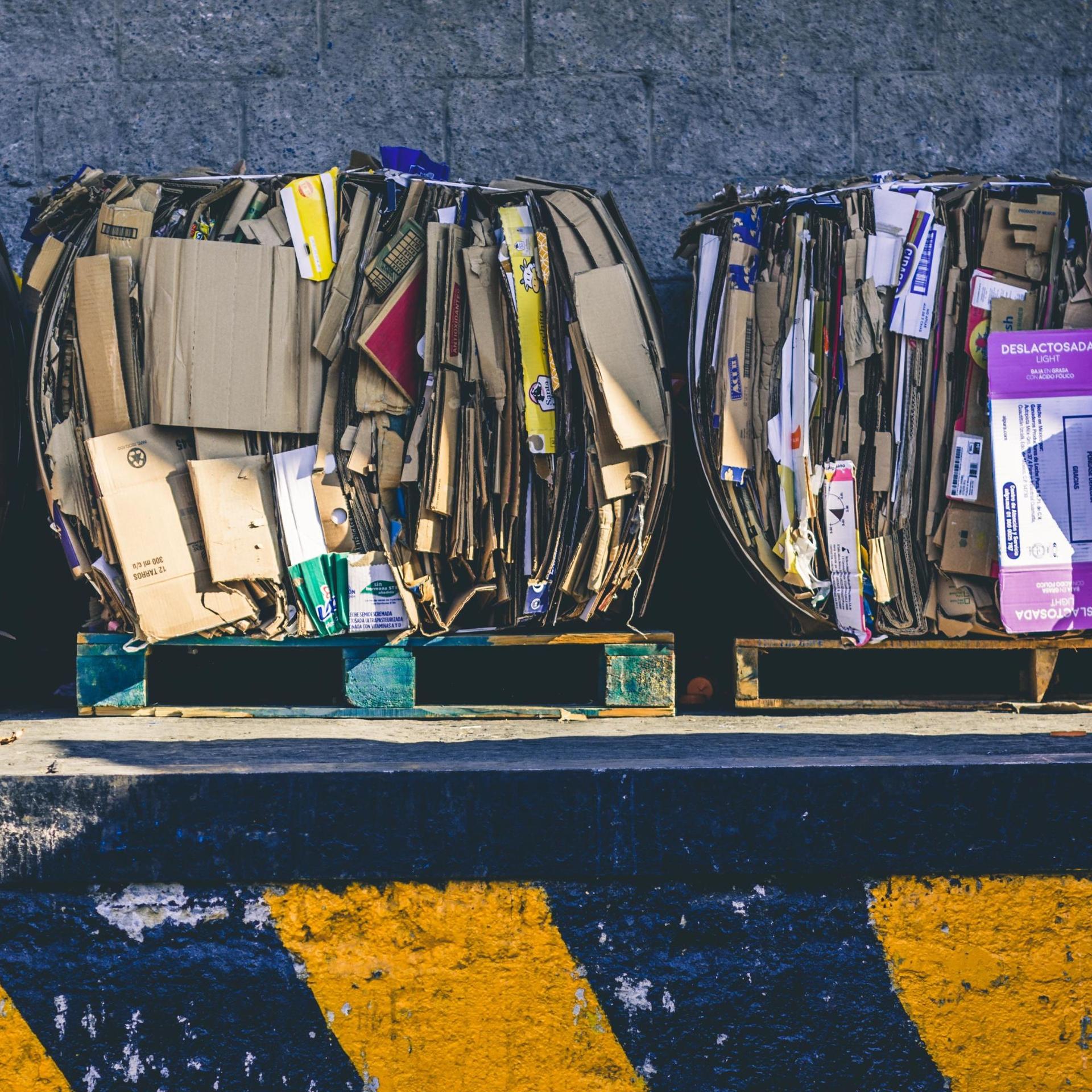 Baled post-consumer waste cardboard, the recycled raw material for Ecotech Kraft paper